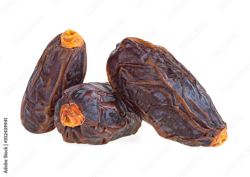 Three big dates fruits isolated on a white background. Dried sweet dates. Three big dates fruits isolated on a white background. Dried sweet dates.