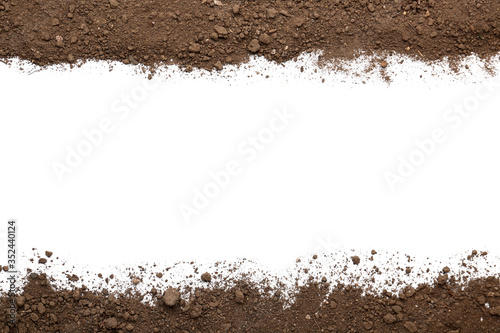 Scattered soil on white bac...