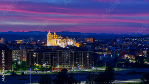 Panoramic photograph of the city of Leon, Spain. It is seen during the start of the blue hour with a spectacular sky and the illuminated Cathedral © Angel Arredondo