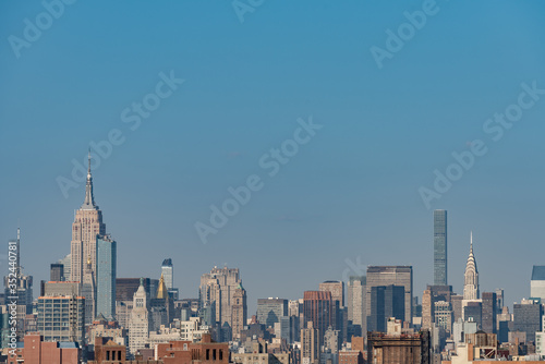 Wide panorama image of skyscrapers in Manhattan, New York at daytime © hit1912