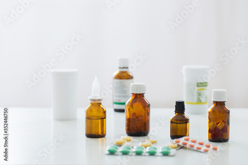 medicine bottle on table on white background