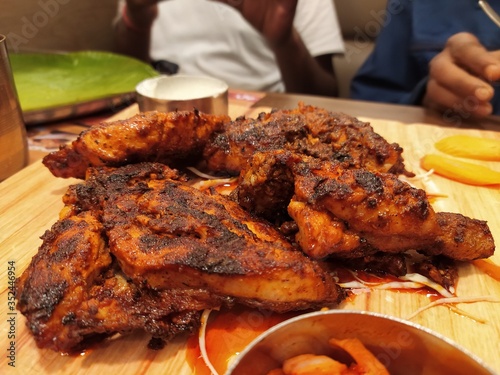 Flamed grilled spicy Peri-Peri chicken.