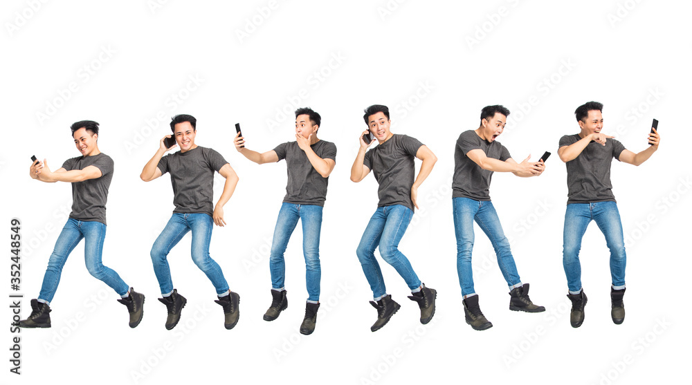 excited young man jumping and using mobile phone concepts excited young man jumping and using mobile phone concepts