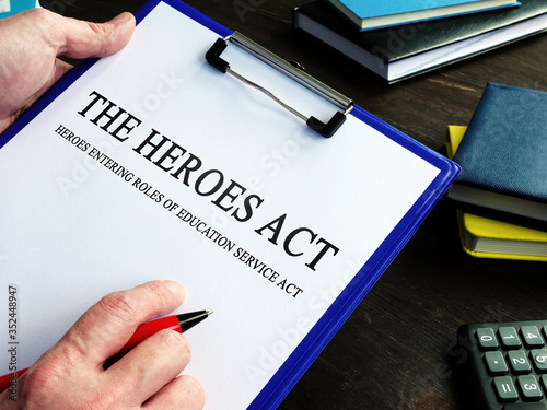 Man reads HEROES Act or Health and Economic Recovery Omnibus Emergency Solutions Act.