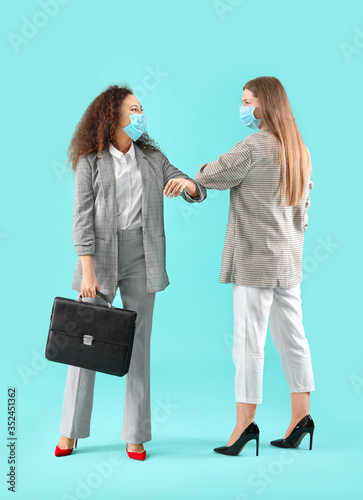 Young women in protective m...