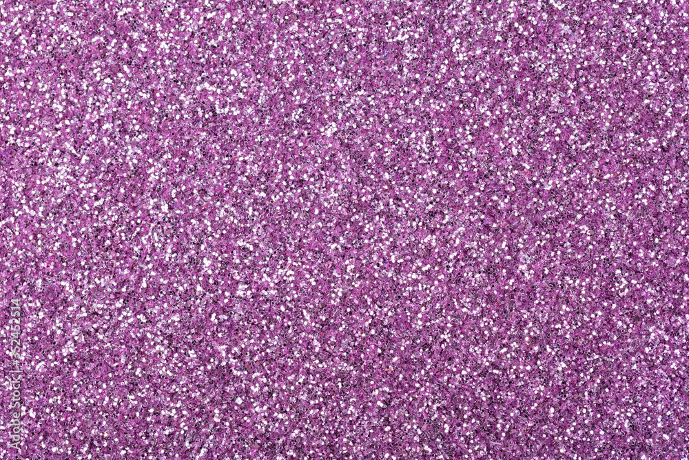 Glitter texture in exquisite violet tone, new background as part of your design work.