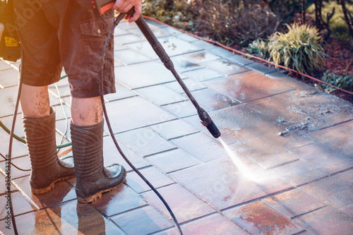Outdoor floor cleaning with high pressure water jet