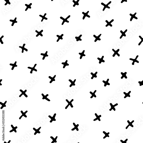Seamless neutral doodle pattern. Black hand-drawn crosses on a white background. Scandinavian cozy ornament. Vector illustrations with geometric shapes for wallpaper, posters, wrapping paper, textiles