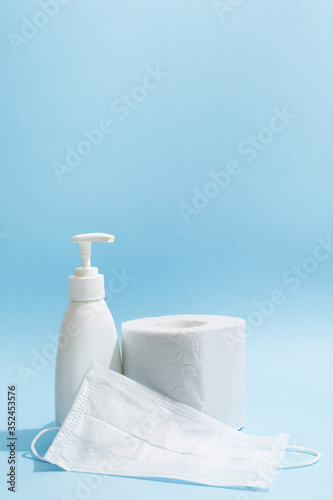 Hygiene supplies antiseptic gel, medicine mask, and toilet paper roll