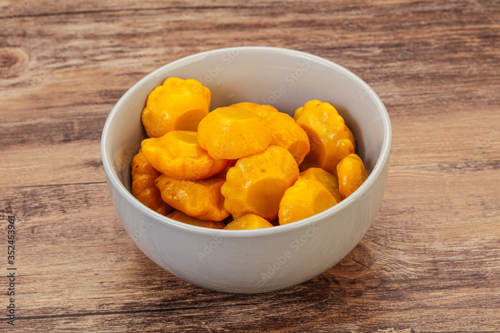 Marinated yellow patisson in the bowl Marinated yellow patisson in the bowl
