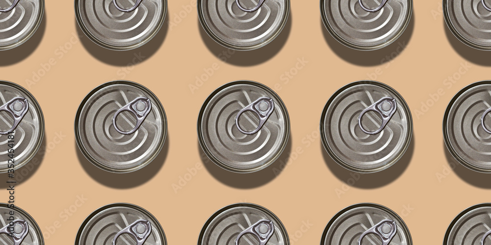 Canned food background. Seamless pattern of tin cans top view Canned food background. Seamless pattern of tin cans top view