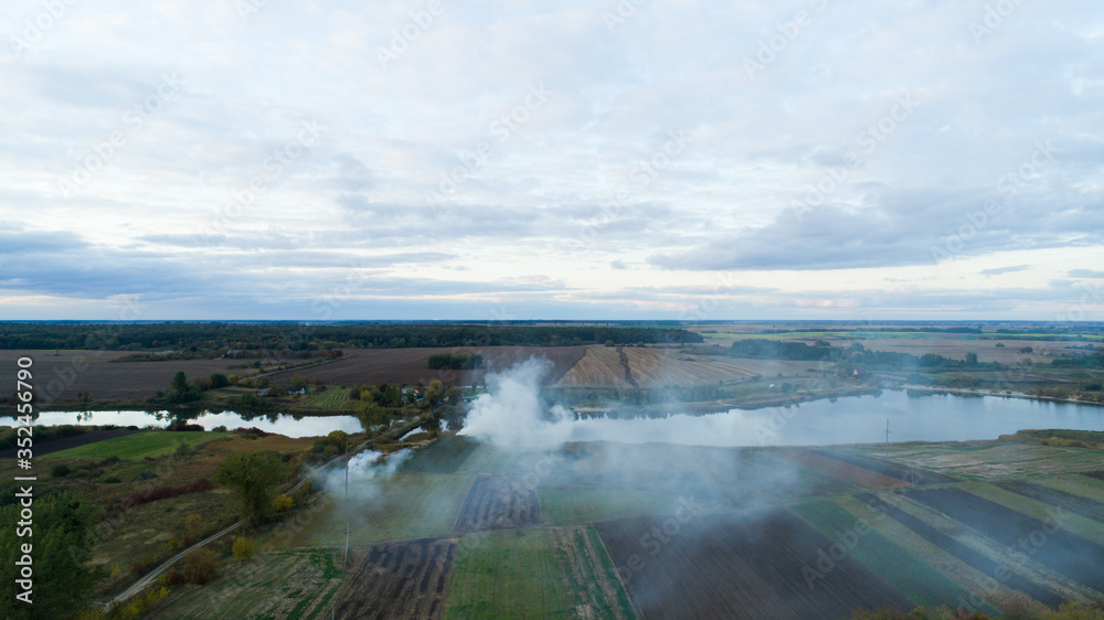 smoke in the field. aerial view smoke in the field. aerial view