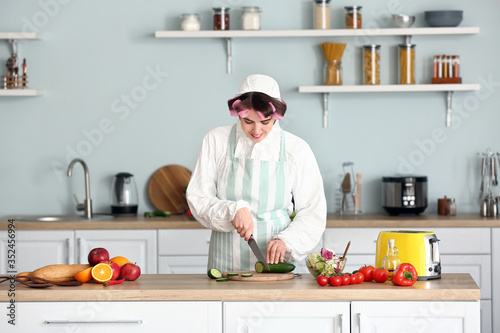 Housewife in protective cos...