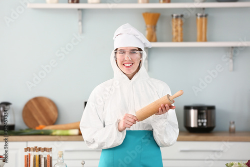Housewife in protective cos...