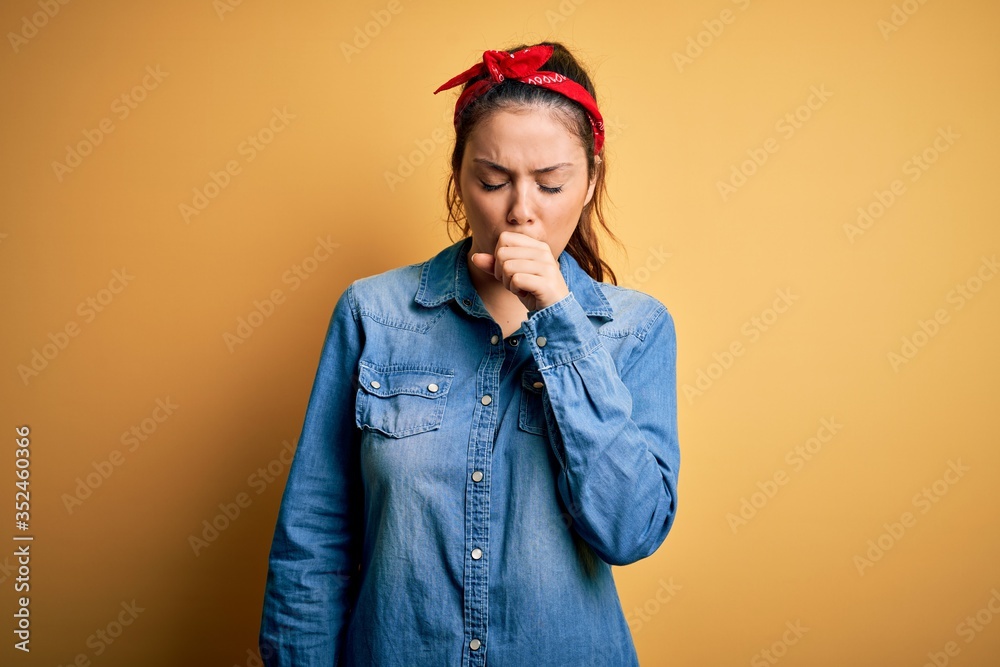 Φωτογραφία Young beautiful brunette woman wearing casual denim shirt and hair handkerchief feeling unwell and coughing as symptom for cold or bronchitis