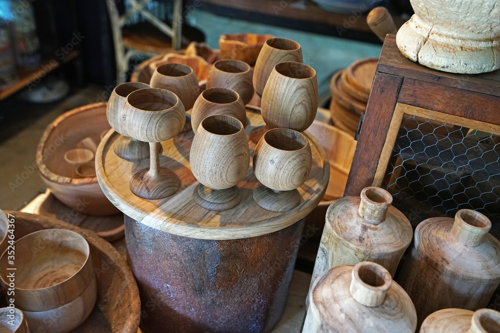 Fototapeta premium Display shelf of wooden handcraft containers