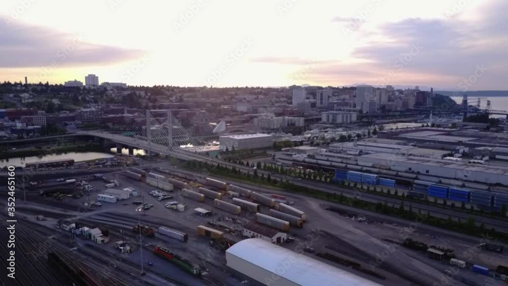 Scenic View Of The East 21st Street Bridge In Tacoma, Washington Over Thea Foss Waterway On A Sunrise - aerial shot Scenic View Of The East 21st Street Bridge In Tacoma, Washington Over Thea Foss Waterway On A Sunrise - aerial shot
