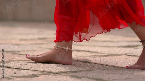 girl waking in rock close up to legs photo