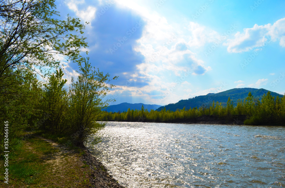 mountain river between sheer cliffs . blue clear water of the river. mountain river between sheer cliffs . blue clear water of the river.