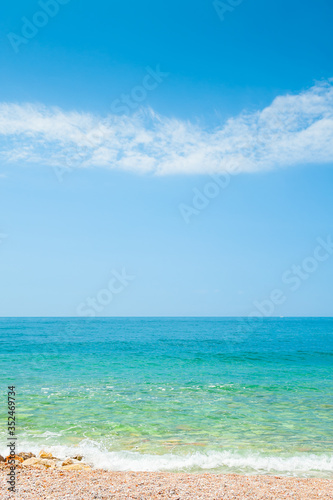 Beautiful beach with white sand and blue sea. Beautiful summer nature background. Travel destination concept