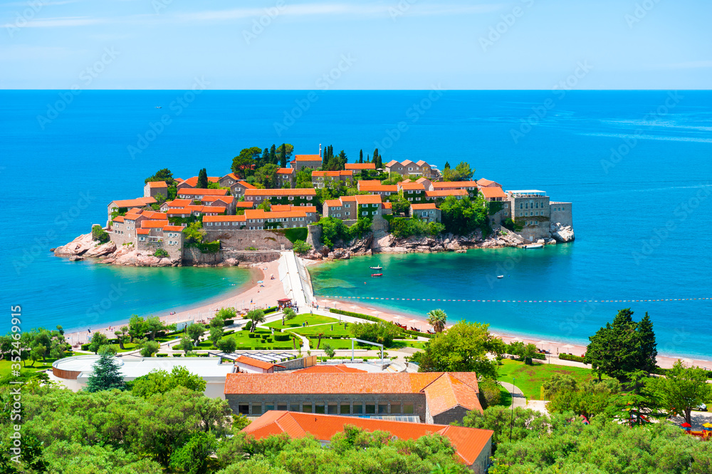 Sveti Stefan island near Budva, Montenegro. Luxury resort with beautiful beach at Adriatic sea. Top view. Famous travel destination