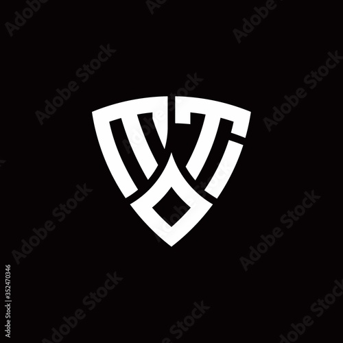 MT monogram logo with modern shield style design template