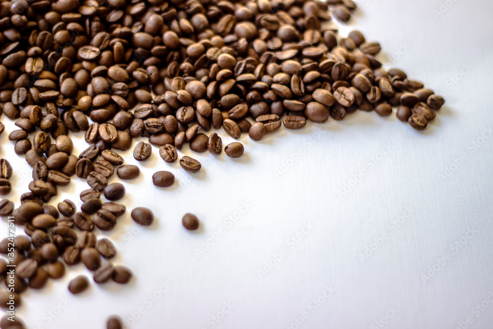 Coffee beans isolated on white background. Mixture of different kinds of coffee beans. Fresh rosted coffee beans on white background, space for text. Close-up. Coffee beans isolated on white background. Mixture of different kinds of coffee beans. Fresh rosted coffee beans on white background, space for text. Close-up.