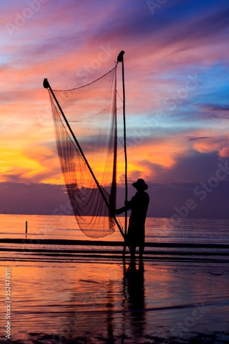 Artwork: fishermen catch fish by net