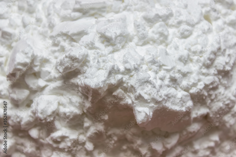 Closeup of cooking white powder starch carbohydrate cooking thickener.