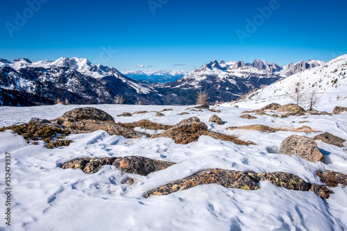 Sunny winter landscape at Ski Area in Dolomites  Italy - Alpe Lusia. Ski resort in val di Fassa near Moena