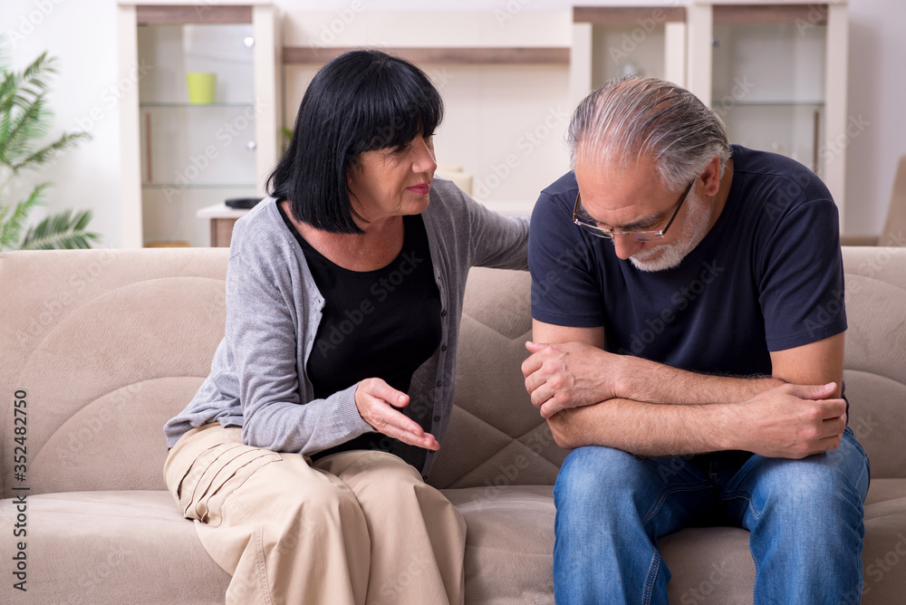 Old couple having argument at home Old couple having argument at home