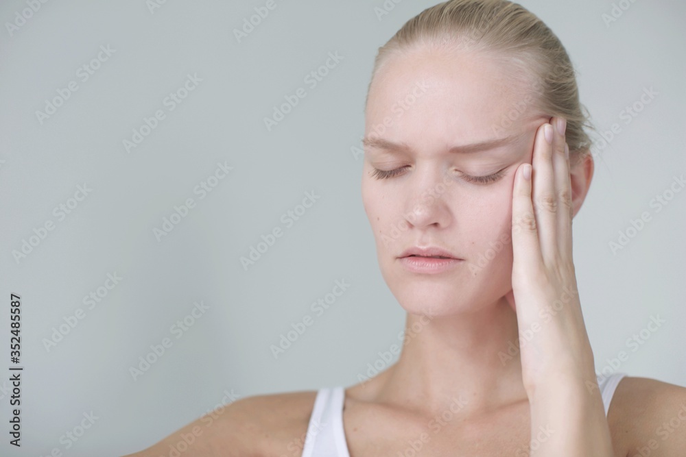 Woman has a headache. Headache problems. Woman has a headache. Headache problems.