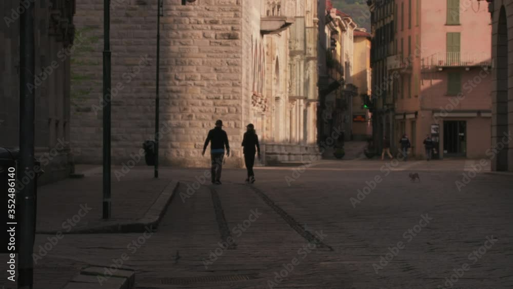 Couple Walking Alone in Como, Italy
