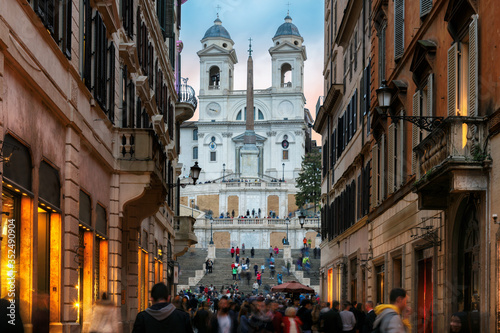 Old cozy street near Spanish Steps in evening in Rome, Italy.  Night cityscape of Rome.  photo