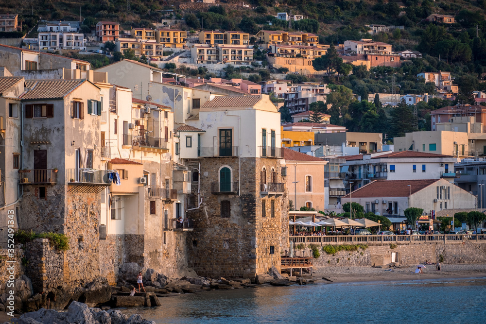 Cefalu, Sicily - October 10 2019: View over Cefalu bay on italian island Sicily with lots of people on the beach
