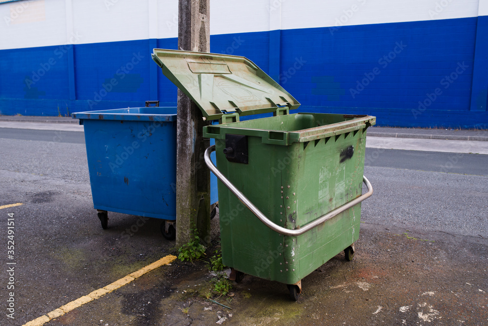 Two garbage bins Two garbage bins