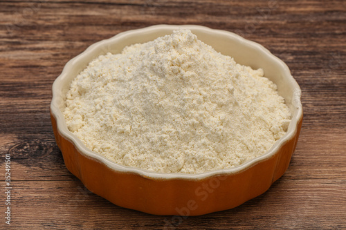 Wheat flour heap in the bowl