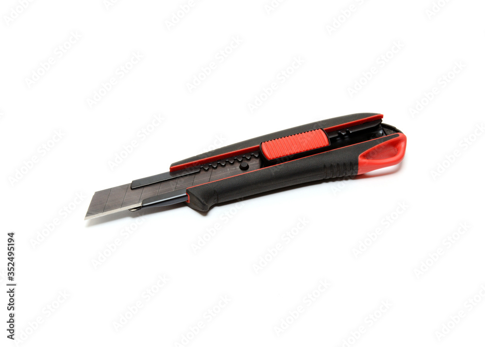construction red knife on a white background. side view. construction red knife on a white background. side view.