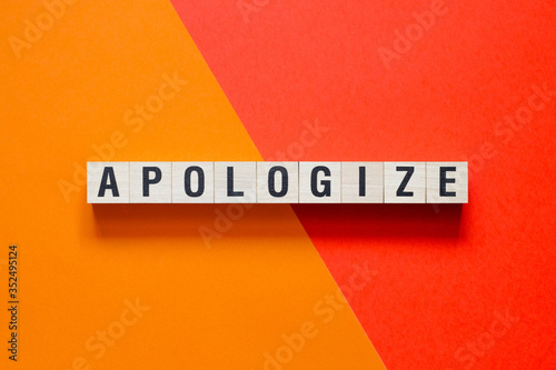 Apologize word concept on cubes
