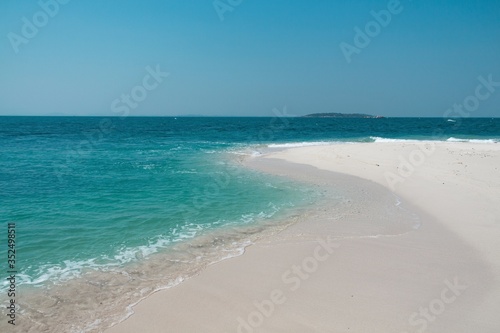 Paradise white sand beach at Koh Munnork beach front resort on private island, Rayong province, Thailand. Summer time. Vacation concept.