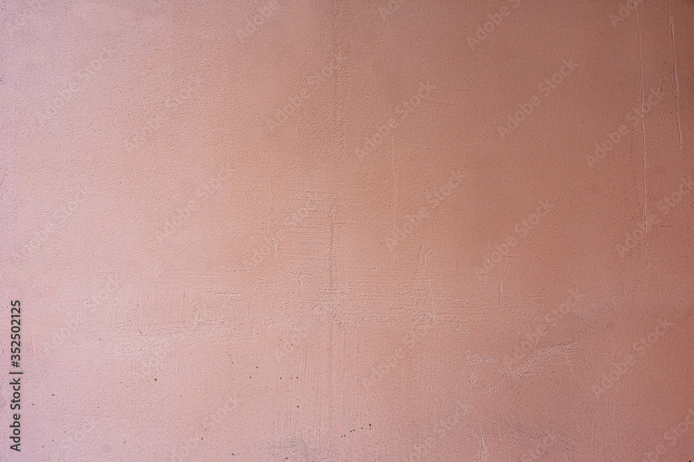 Fototapeta premium old concrete wall painted in light burgundy color