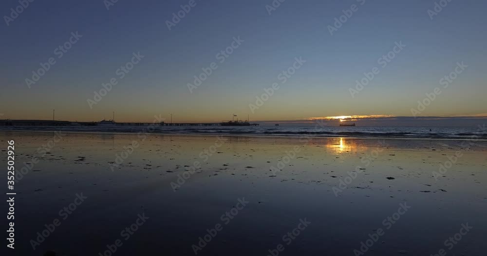 Beach sunrise (drone travelling) on Puerto Madryn, Argentina Beach sunrise (drone travelling) on Puerto Madryn, Argentina