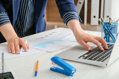 Female accountant working i...