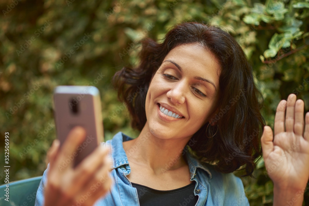 Woman with a smart phone in her hands. Woman with a smart phone in her hands.