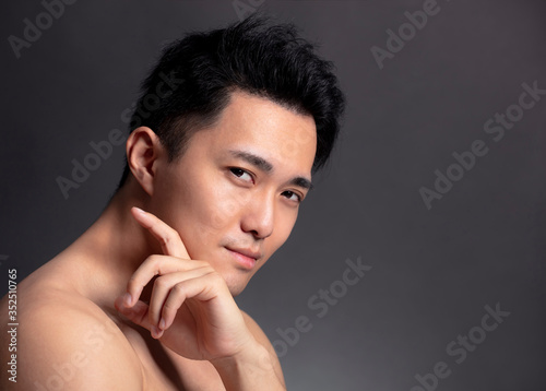 Closeup of attractive young asian man face