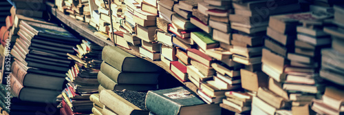 Stack of books at the bookshop banner photo