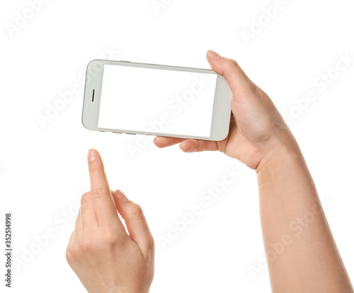 Female hands with mobile phone on white background