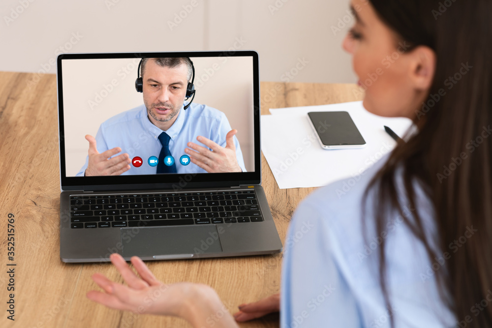 Workers having discussion during video call at home Workers having discussion during video call at home