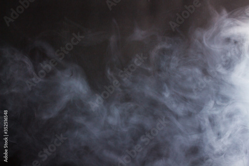 Cigarette smoke on a black background