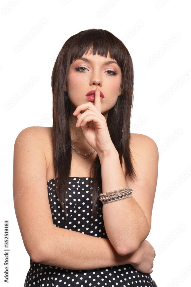 Close up portrait of beautiful woman gesturing silence Close up portrait of beautiful woman gesturing silence